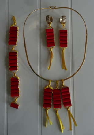 Dije, aretes y pulsera
