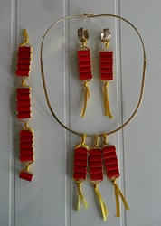 Dije, aretes y pulsera